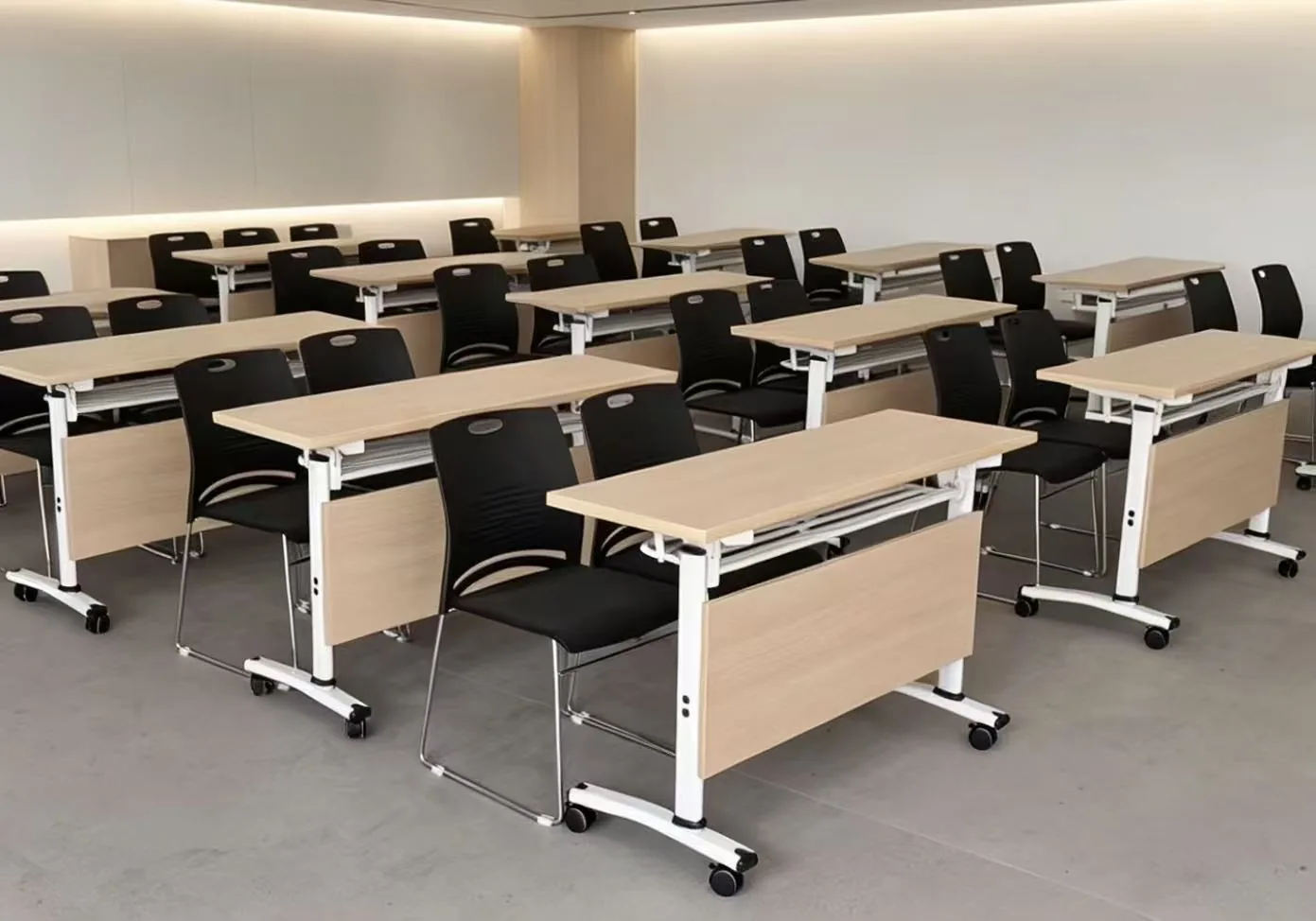 Mobile training tables arranged in a classroom
