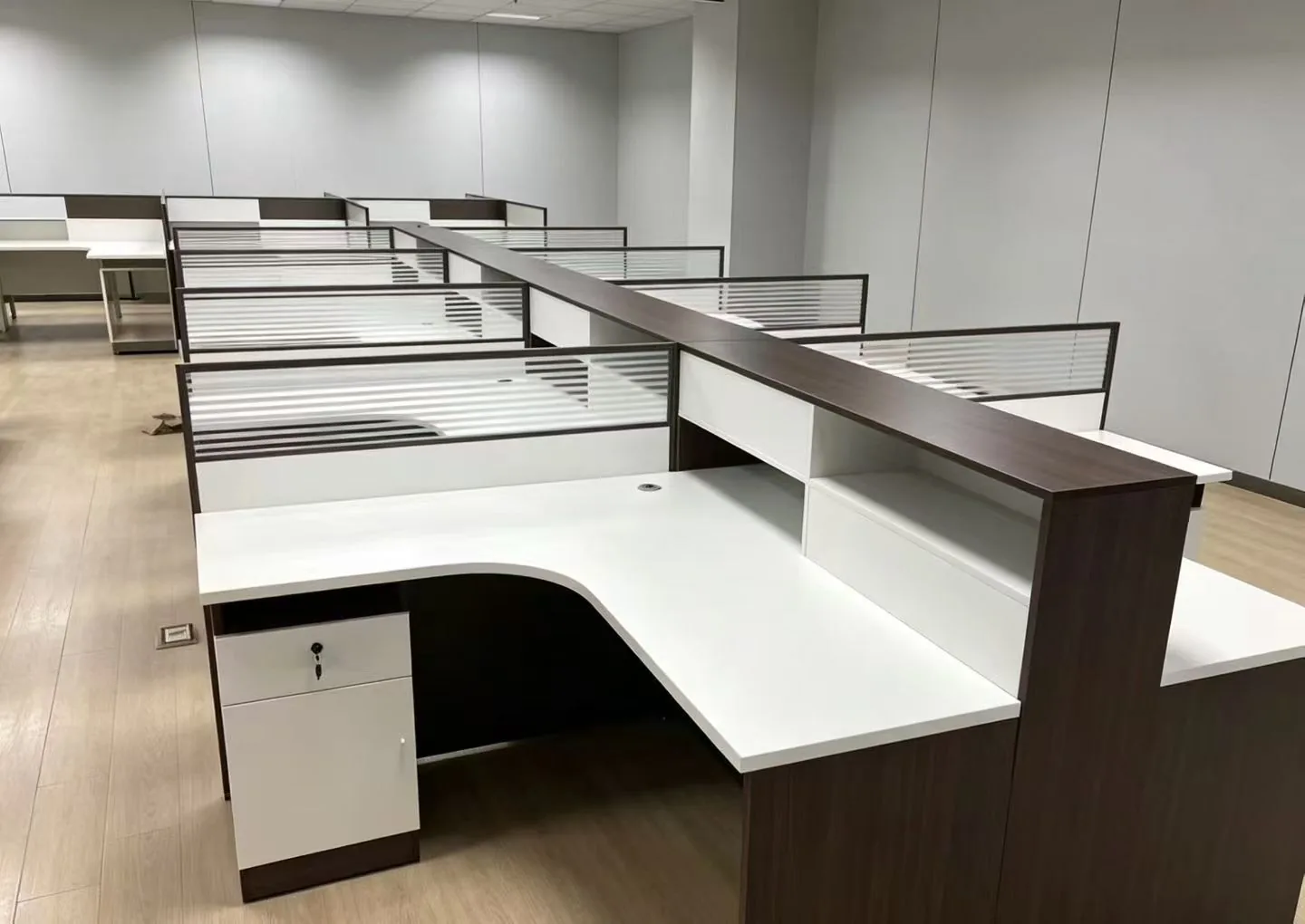 Dark wood corner workstations