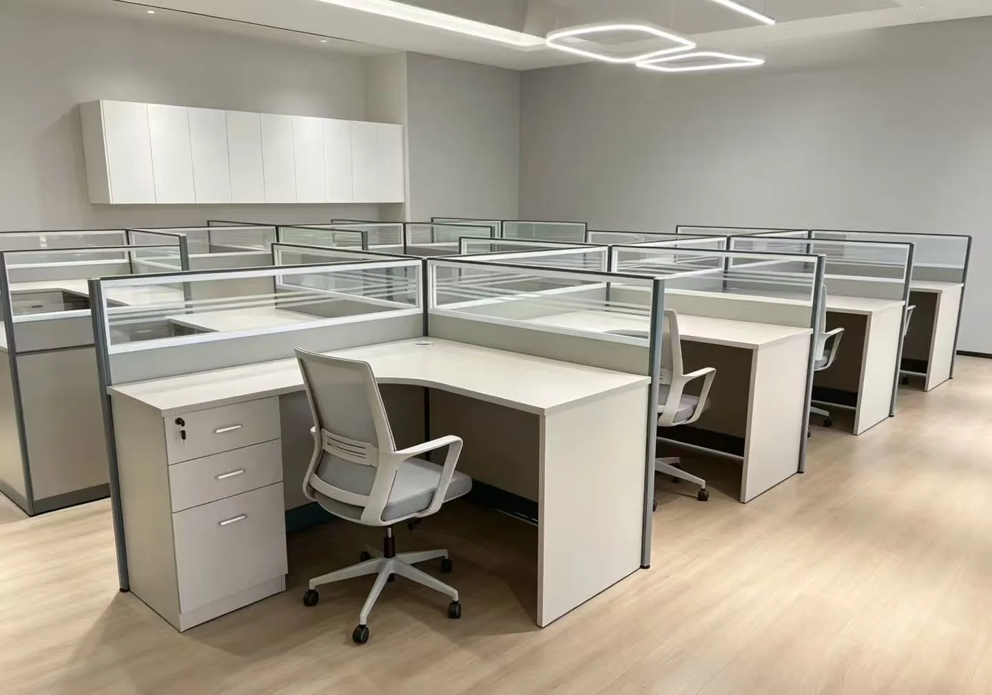 White panel workstation area