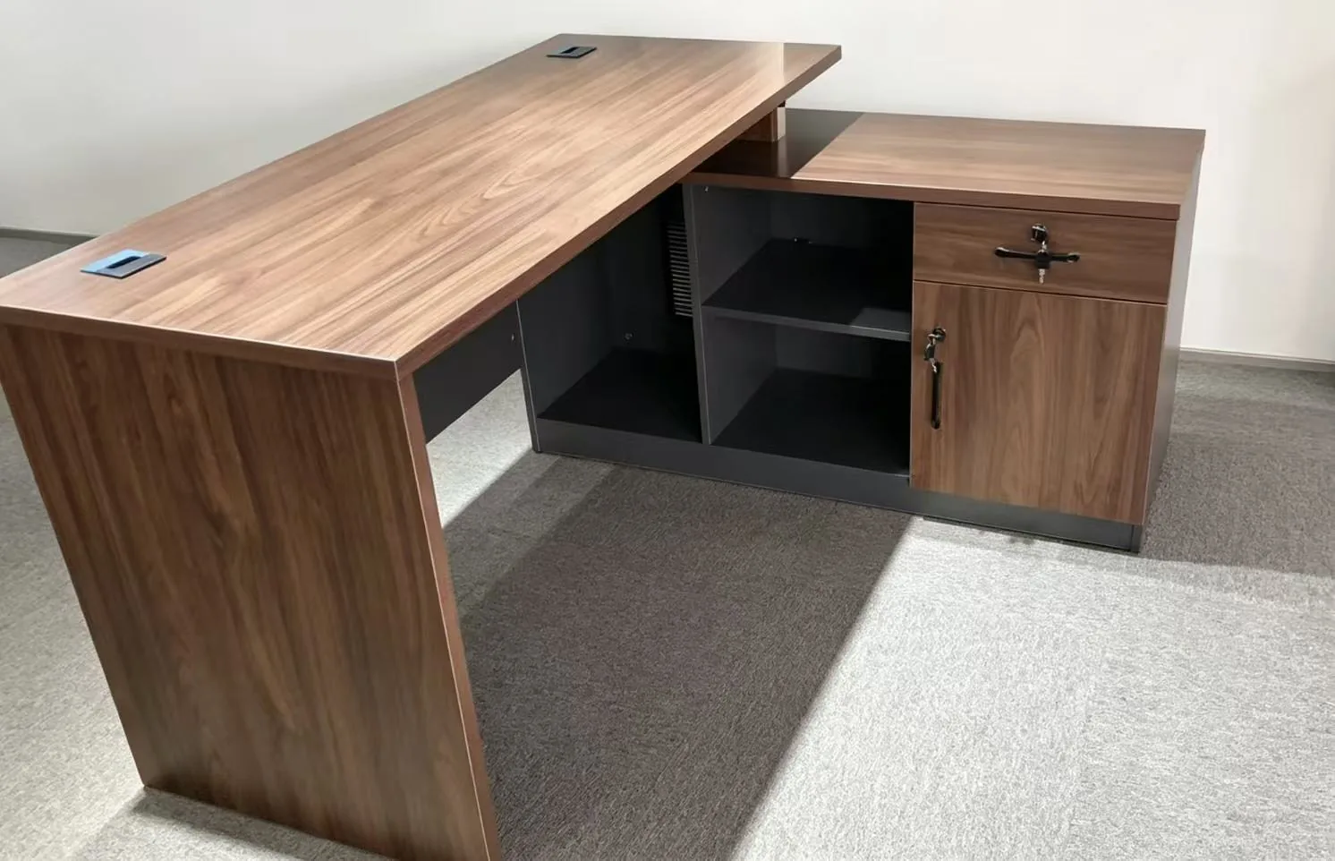 Dark wood corner executive desk
